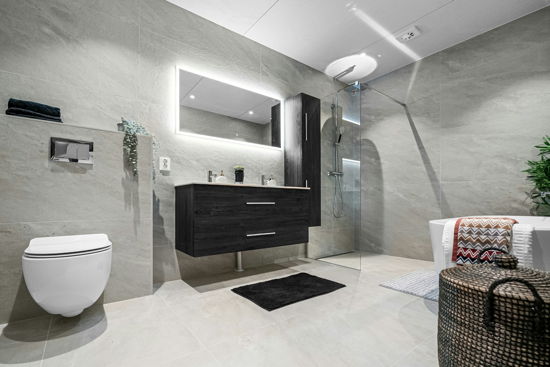 Luxury bathroom remodel with walk-in shower, freestanding tub, and custom vanity